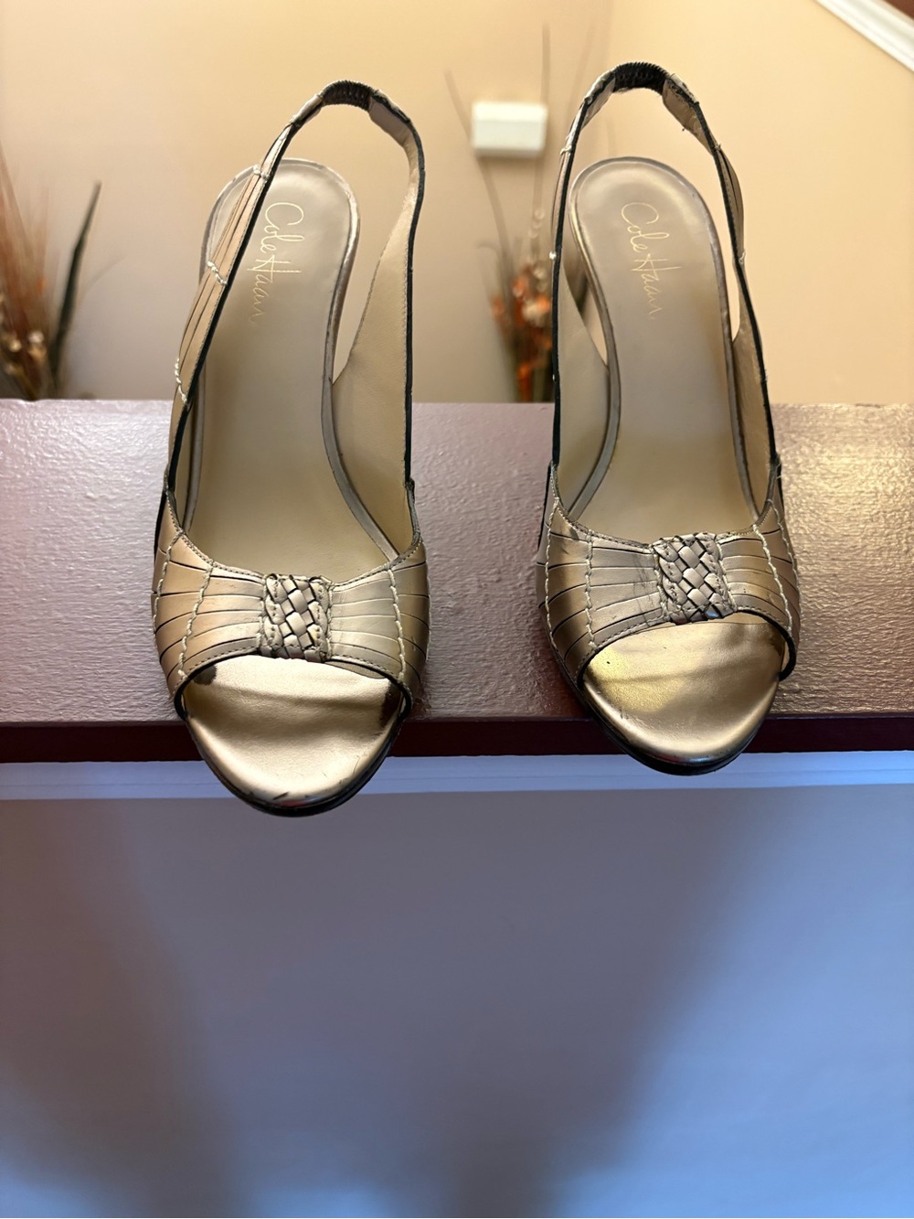 Cole Haan Gold Peep-Toe Slingback Heels with Woven Detail.